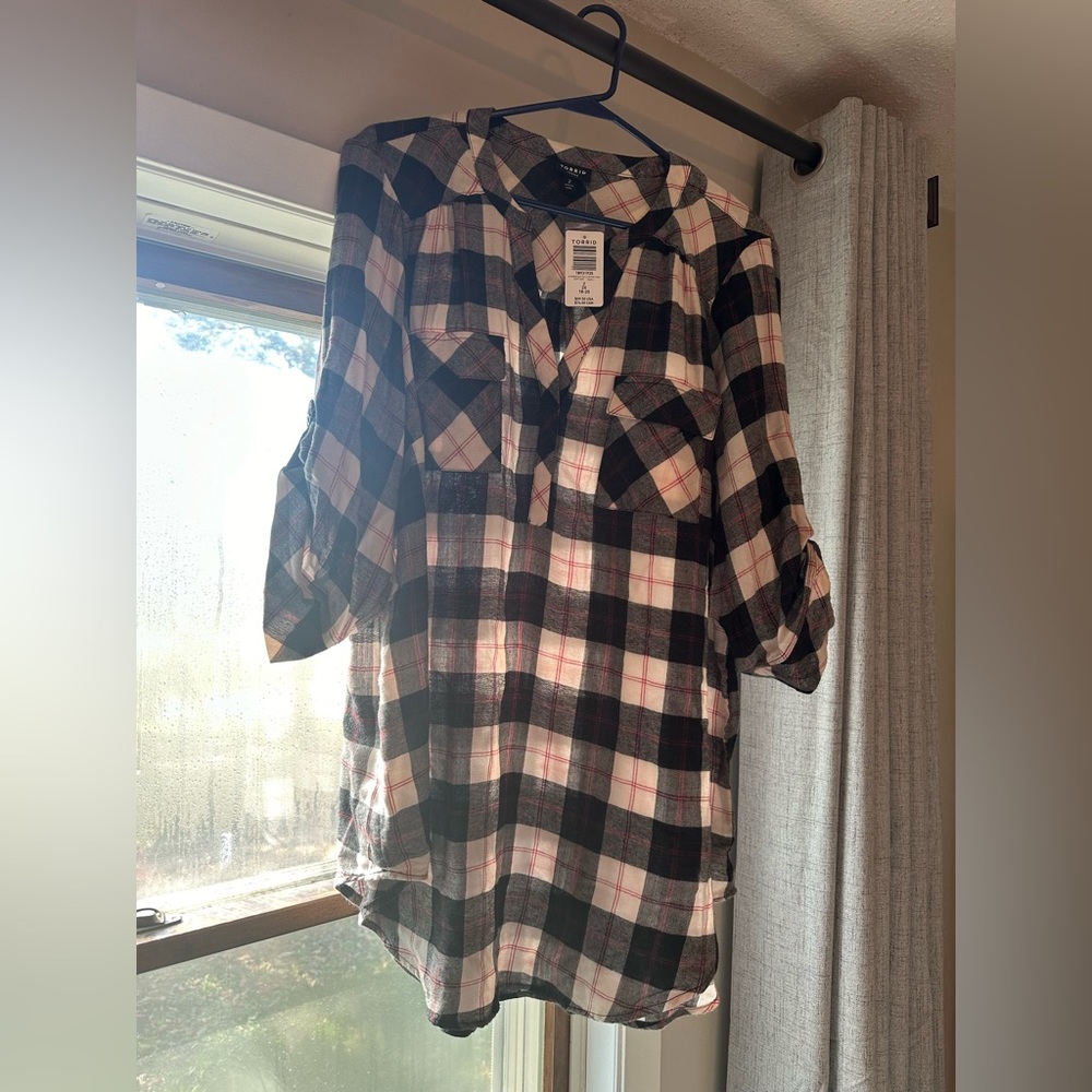 Plaid top with button detail. Size 2 from Torrid, brand new with tags.